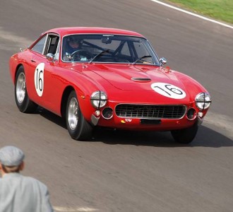 Red car on the finish home straight